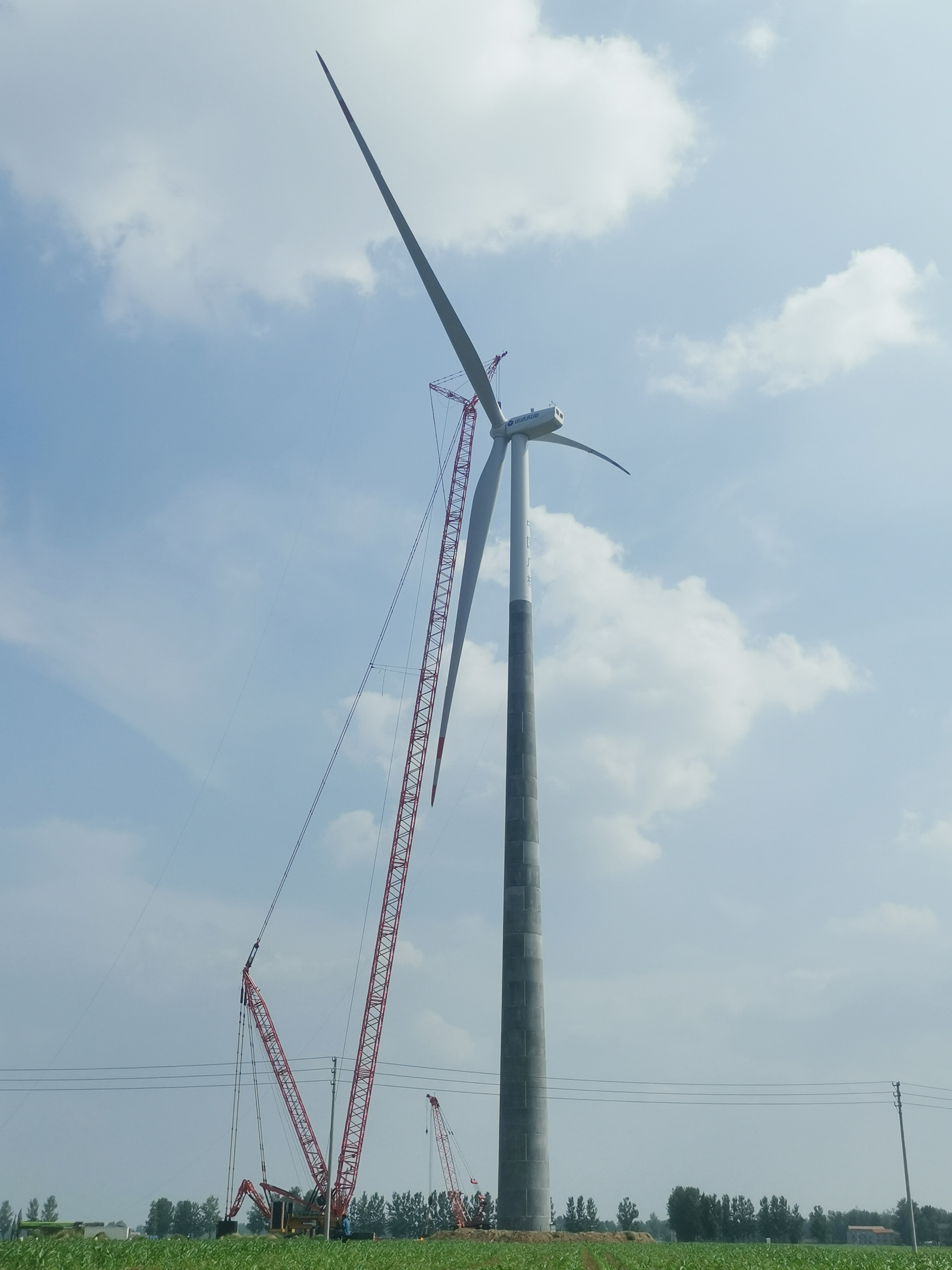 公司首台！！！150米混塔机组顺遂并网